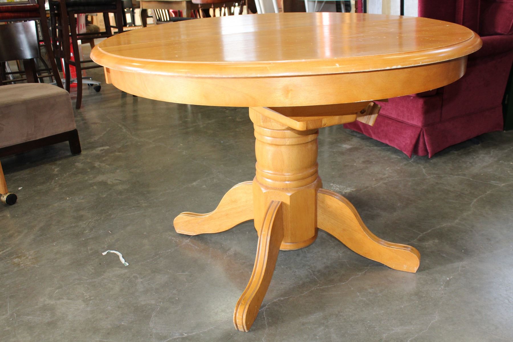Round Maple Dining Table With Jack Knife Leaf And Four Oak Rolling Image 3 Round Maple Dining Table With Jack Knife Leaf And Four Oak Rolling Chairs