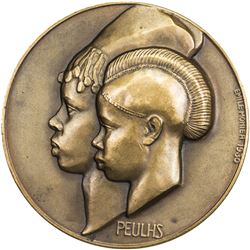 GUINEA: AE medal (105.7g), 1933. VF-EF