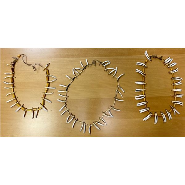 PAPUA NEW GUINEA: LOT of 3 pig teeth necklaces, VF
