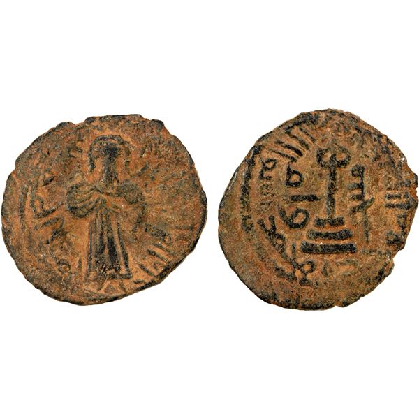 ARAB-BYZANTINE: Standing Caliph, ca. 692-697, AE fals (3.97g), Manbij, ND, nearly VF