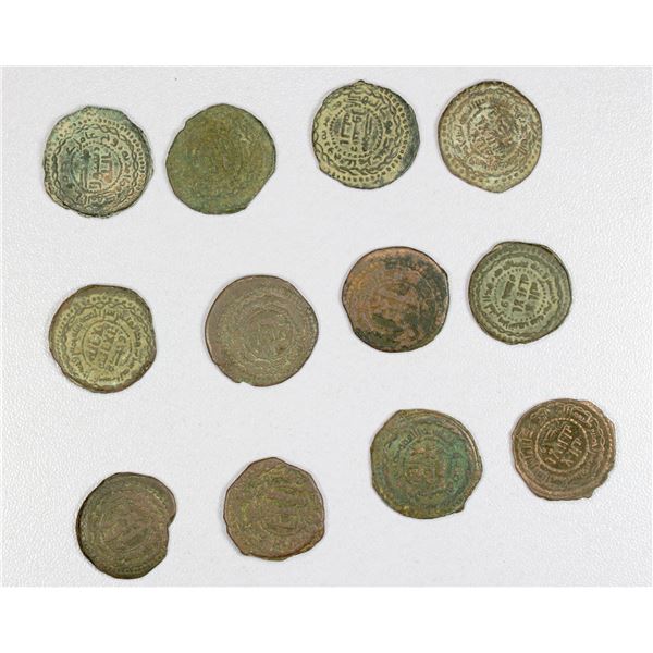 ISLAMIC: ABBASID: LOT of 12 copper fulus