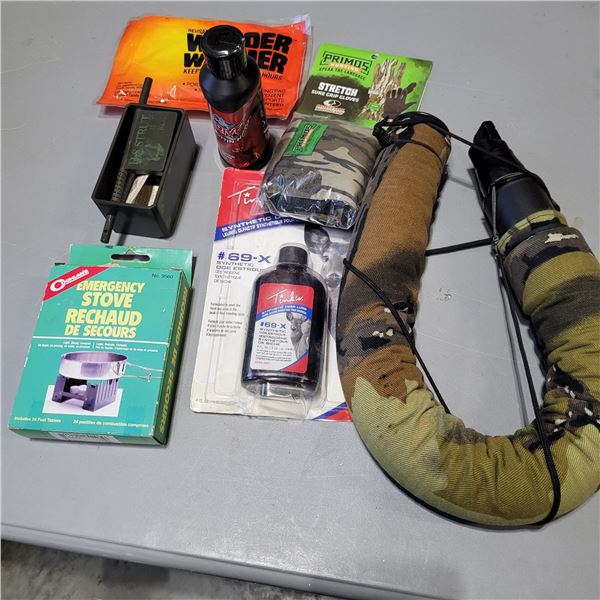 Assortment of Game Calls, Scent, Gloves, Hand warmers and an Emergency Stove