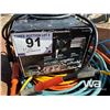 Image 6 : WHEEL BARROW, ELECTRICAL CORD, BATTERY CHARGER