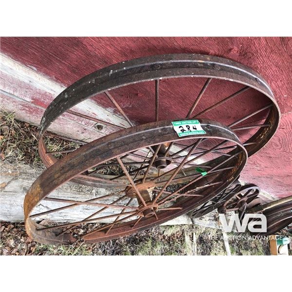 (2) LARGE ANTIQUE STEEL WHEELS
