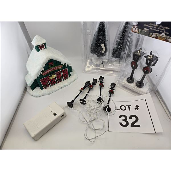ASSORTED CHRISTMAS VILLAGE ACCESSORIES LOT WITH LAMPPOSTS, TREES, AND REINDEER STABLE