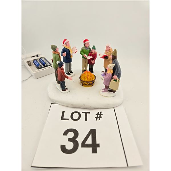 LIGHTED CHRISTMAS CAROLERS FIGURINE SCENE WITH CAMPFIRE