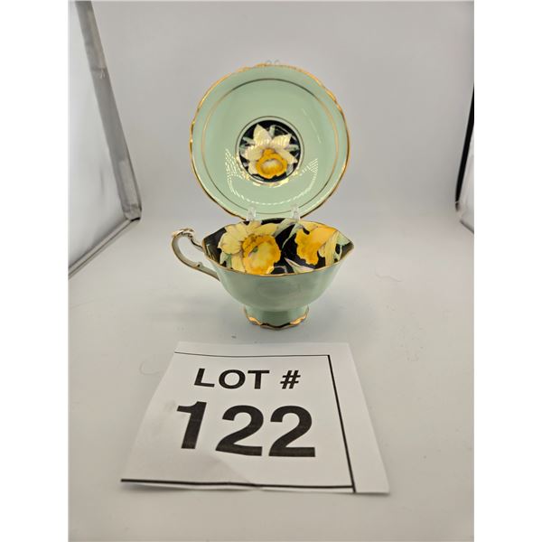 PARAGON FINE CHINA TEACUP AND SAUCER WITH YELLOW FLORAL INTERIOR, ENGLAND