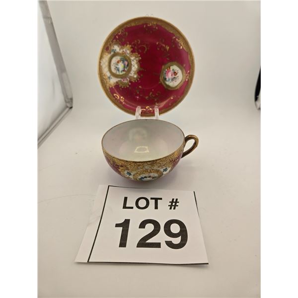 JAPANESE HAND-PAINTED GILT PORCELAIN TEACUP AND SAUCER WITH FLORAL MEDALLIONS