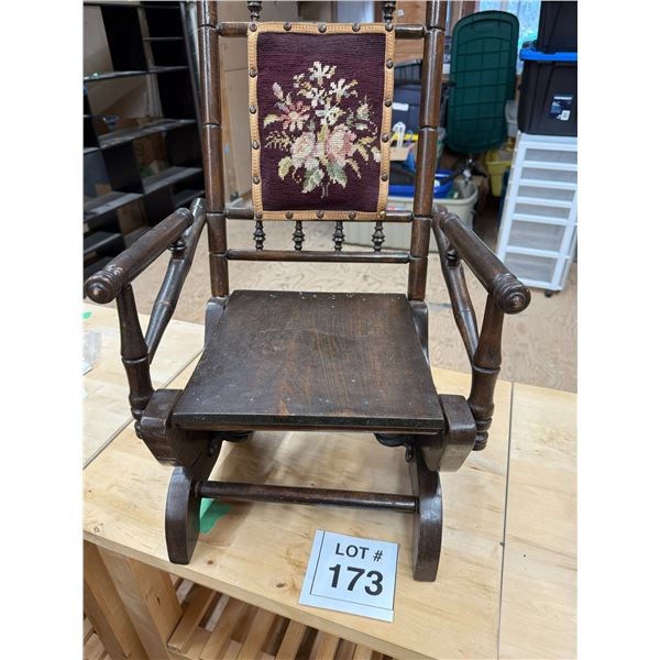 ANTIQUE WOODEN ROCKING CHAIR WITH NEEDLEPOINT BACK PANEL