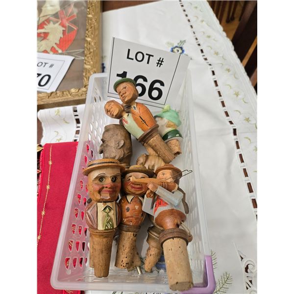 CARVED WOOD FIGURAL BOTTLE STOPPERS – ANRI STYLE