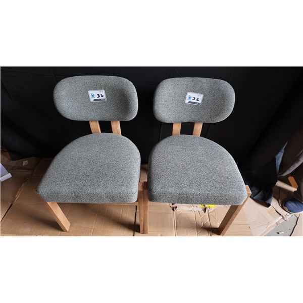 Two Upholstered Dining Chairs with Wooden Legs