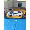 Image 1 : RASTAR AVENTADOR LP 700-4 1:14 DIECAST MODEL CAR