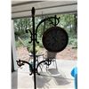 Image 1 : FREESTANDING ANALOG CLOCK WITH ORNATE METAL STAND