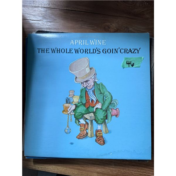 APRIL WINE THE WHOLE WORLD'S GOIN' CRAZY VINYL RECORD
